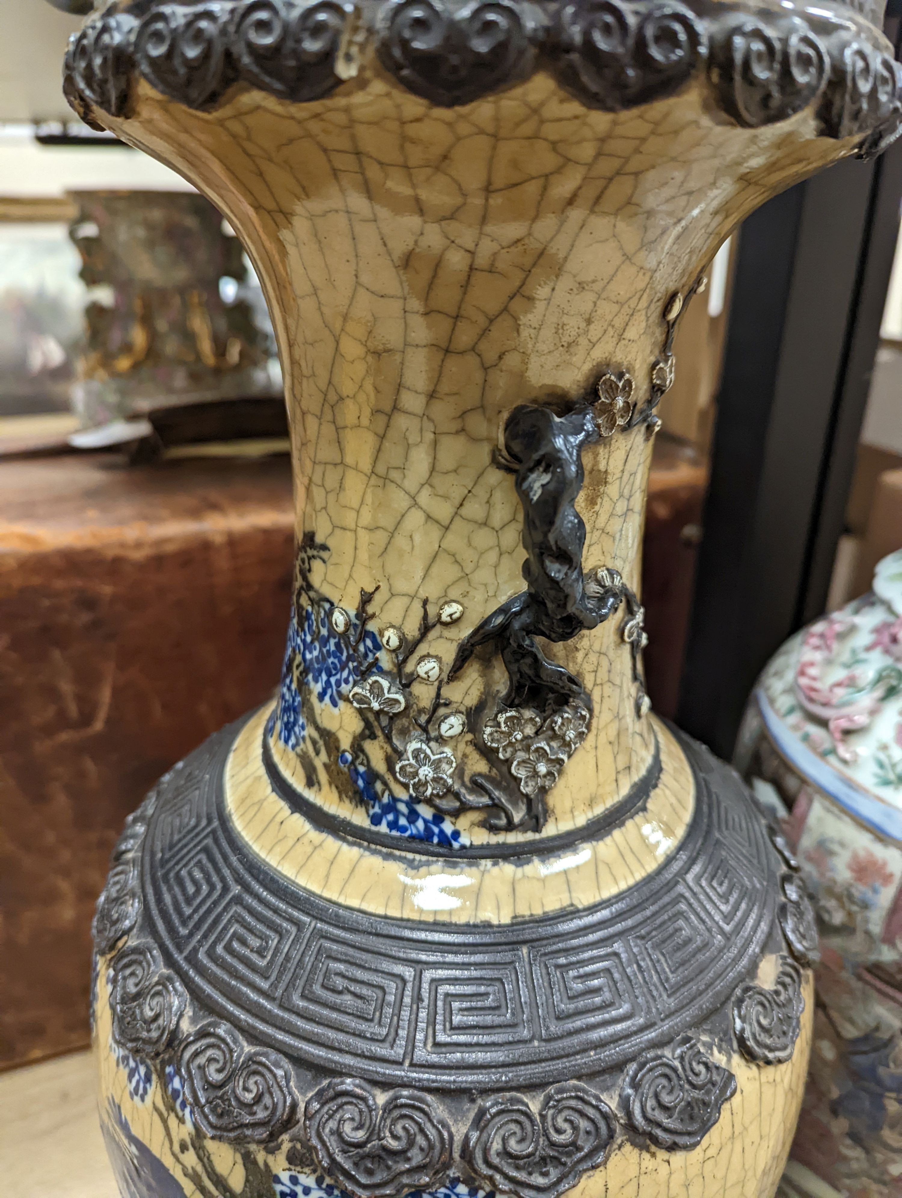 A large Chinese crackle glaze vase, late 19th/early 20th century and a large Chinese famille rose vase, late 19th century, tallest 60 cm.